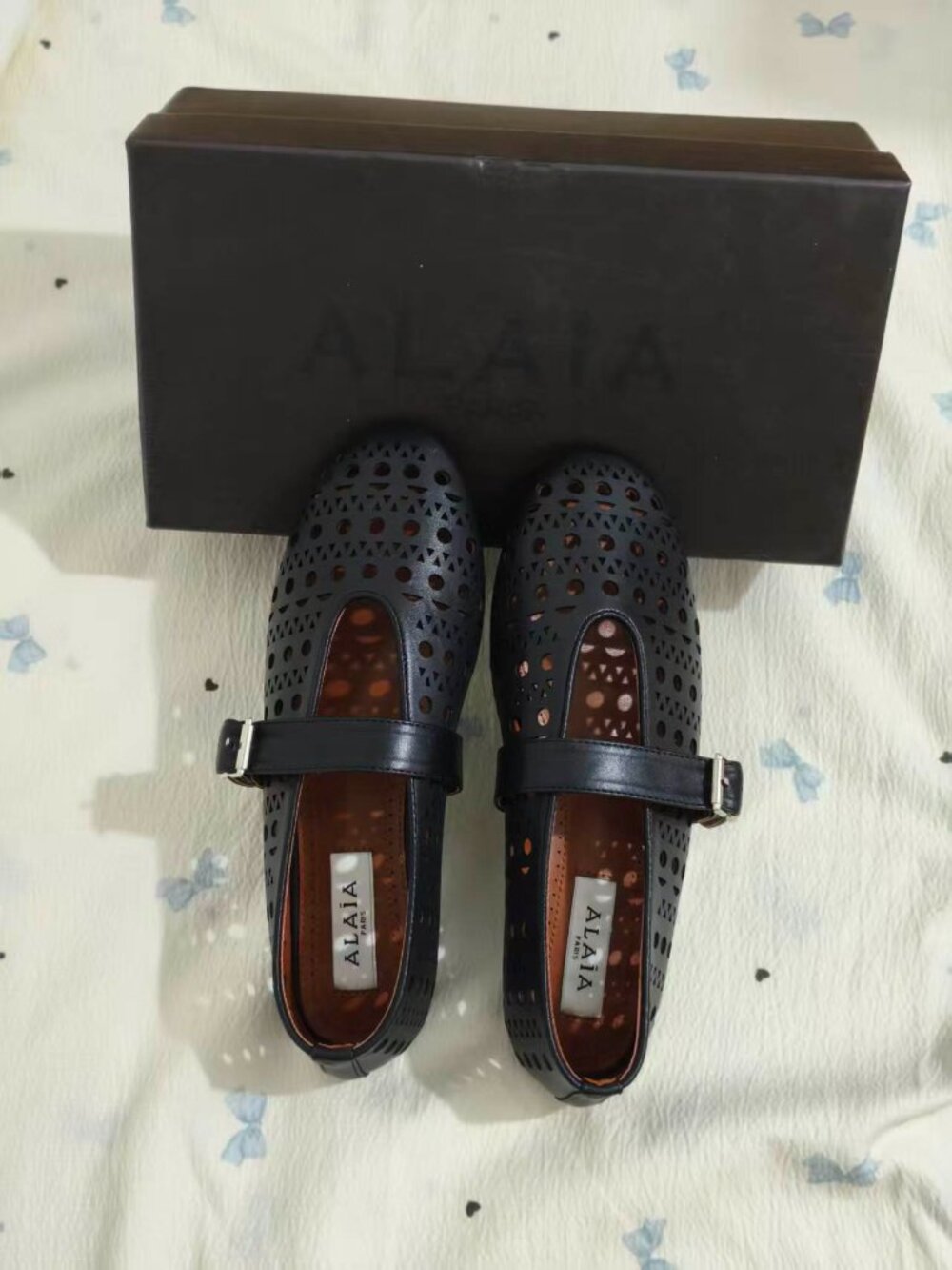 Alaïa Black Cutout Leather Mary Jane Flat Shoes